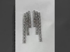 सफेद अंडाकार पत्थर टेनिस हार